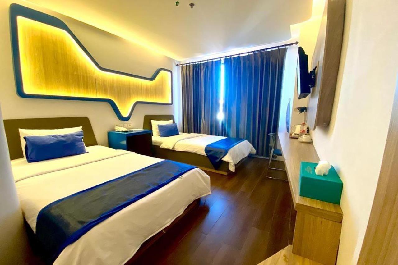 Golden Palace Hotel Batu Merah Buitenkant foto